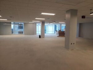 Interior of an empty office building with light gray walls in Richmond, VA